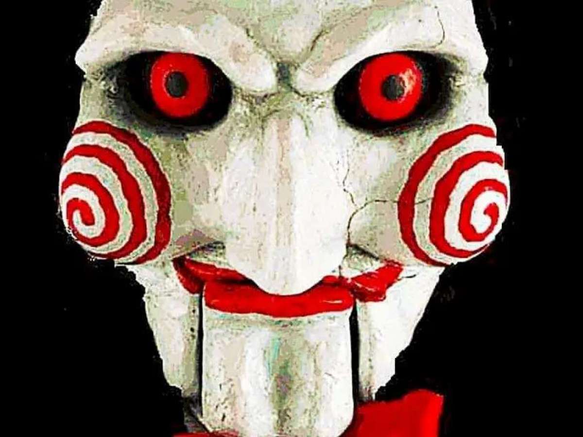Jogos Mortais - Novo poster do filme mostra o assustador mascote