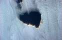 As nuvens passam com rapidez, mas o astronauta Chris Hadfield conseguiu capturar um "rombo" no formato de coração exatamente em 14 de fevereiro, Dia de São Valentim - o Dia dos Namorados em muitos países