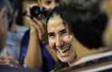 Blogueira cubana sorri durante o evento realizado no Estadão