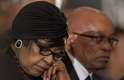 8 de dezembro - O presidente da África do Sul, Jacob Zuma, comparece a um evento em memória de Nelson Mandela ao lado de Winnie Madikizela-Mandela, ex-mulher do líder sul-africano. A cerimônia foi realizada em uma igreja de Joanesburgo