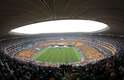 10 de dezembro - Público praticamente encheu o FNB Stadium para a despedida de Mandela