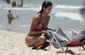 4 de janeiro - Somente com um banho de mar para aliviar o calor na beira da praia na Barra da Tijuca/RJ