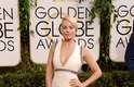 As celebridades exibiram elegância na chegada ao Globo de Ouro neste domingo (12), em Los Angeles. Na foto, Margot Robbie