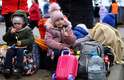 Dia 2/3 - Crianças ucranianas são fotografadas em um campo de refugiados na Polônia