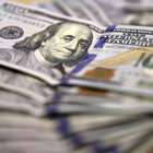 Após pesquisa mostrar Dilma à frente de Aécio, dólar sobe 1%