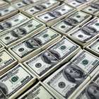 Dólar tem leve alta contra real mas caminha para fechar ...