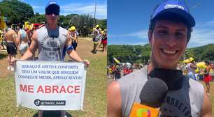 Influencer conhecido como 'Anjo do Abraço' explica como surgiu ideia durante bloco em SP