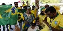 Torcedores do Brasil em Doha, no Catar  Foto: Reuters / BBC News Brasil