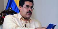 Maduro afirmou que a Constituição não obriga Chávez a assumir o novo mandato em 10 de janeiro  Foto: AFP