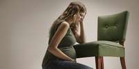 A ausência de sintomas - ou a não-percepção deles - é o que leva algumas mulheres a descobrirem a gravidez tardiamente, às vezes, já em trabalho de parto  Foto: Getty Images 