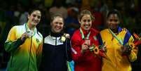 <p>Mayra Aguiar e Ronda Rousey fizeram a final dos Jogos Pan-Americanos de 2007</p>  Foto: Getty Images 