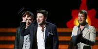 O grupo britânico Mumford & Sons levou para casa o prêmio de Melhor Álbum, por Babel  Foto: Reuters