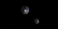 <p>Nasa divulgou imagem de simulação da passagem do asteroide 2012 DA14. Agência vai monitorar o asteroide</p>  Foto: NASA / Reuters