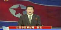Imagem da TV estatal norte-coreana mostra um apresentador confirmando a realização do teste nuclear  Foto: AFP