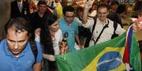 <p>A blogueira cubana Yoani S&aacute;nchez, mais conhecida ativista de oposi&ccedil;&atilde;o do pa&iacute;s, &eacute; recebida com protestos ao desembarcar nesta segunda-feira no Recife</p>  Foto: Helia Scheppa / Reuters