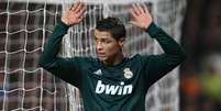 Cristiano Ronaldo evita comemorar depois de fazer o gol da virada do Real Madrid  Foto: Getty Images 