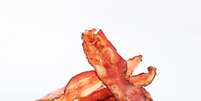 <p>A carne processada é feita com a combinação de restos de animais, como articulações, que contêm alta concentração de gorduras</p>  Foto: Getty Images 