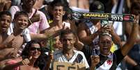Torcedores de Botafogo e Vasco compareceram em bom n&uacute;mero ao Engenh&atilde;o para a final da Ta&ccedil;a Guanabara, que viu a equipe da estrela solit&aacute;ria sair com o t&iacute;tulo  Foto: Mauro Pimentel / Terra