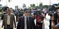 <p>M&aacute;rcio Nakashima, irm&atilde;o de M&eacute;rcia, chega para acompanhar o julgamento</p>  Foto: Fernando Borges / Terra