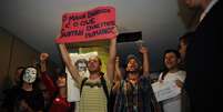 Manifestantes protestam na Câmara  Foto: José Cruz / Agência Brasil