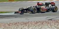 <p>Kimi Raikkonen liderou o segundo treino e bateu o tempo de Mark Webber, líder da primeira sessão; nos tempos somados, australiano foi apenas o quarto colocado</p>  Foto: AFP