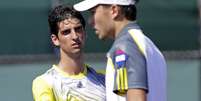 <p>Brasileiro alegou dores e decidiu se poupar para a chave de simples, na qual enfrenta o italiano Andreas Seppi</p>  Foto: AP