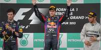 <p>P&oacute;dio do GP da Mal&aacute;sia foi marcado por clima ruim na Red Bull</p>  Foto: AFP