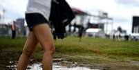 <p>Chuva da madrugada deixou gramado do Jockey Club cheio de poças de lama</p>  Foto: Fernando Borges / Terra