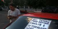 Taxista protesta contra a violência   Foto: Daniel Favero / Terra