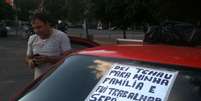 <p>Taxista protesta contra a violência em Porto Alegre</p>  Foto: Daniel Favero / Terra