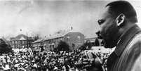 <p>Martin Luther King durante discurso pró-direitos humanos em Selma, Alabama (EUA), em 1965</p>  Foto: Getty Images 