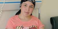 Imagem de 2011 mostra Derya Sert, a primeira mulher a receber um transplante de útero de uma doadora morta  Foto: AFP