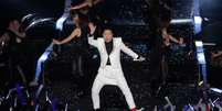 O rapper sul-coreano Psy lan&ccedil;ou o v&iacute;deo e a dan&ccedil;a da sua m&uacute;sica 'Gentleman' durante um show lotado neste s&aacute;bado (13), em Seul  Foto: Getty Images 