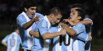 Argentina sofreu empate no fim, mas mesmo assim comemorou o título em casa  Foto: AP