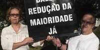 <p>Moradores do bairro Jardim Anchieta, em São Bernardo do Campo, organizam passeata exigindo a redução da maioridade penal em 2013</p>  Foto: Daniel Sobral / Futura Press