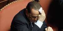 <p>Berlusconi durante sessão no Parlamento, em Roma, em 30 de abril</p>  Foto: Reuters