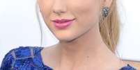 A cantora Taylor Swift foi a grande vencedora dos prêmios Billboard 2013, neste domingo (19), depois de ganhar oito prêmios na cerimônia realizada em Las Vegas. Swift foi nomeada melhor artista do ano, dominou no gênero de música country e seu disco, Red  Foto: Getty Images 
