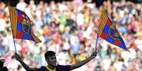 <p>Ex-santista teve recepção de astro no Camp Nou</p>  Foto: AFP
