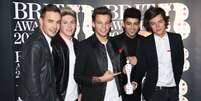 <p>Grupo One Direction irá lançar perfume em agosto deste ano</p>  Foto: Getty Images 