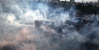 Novos enfrentamentos entre a polícia e manifestantes na Praça Taksim, em Istambul  Foto: AP