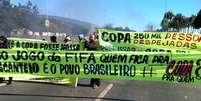 <p>Manifestantes protestam em Brasília na véspera do início da Copa das Confederações</p>  Foto: Ricardo Matsukawa / Terra