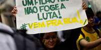 <p>Slogans publicitários foram usados por manifestantes em diversos protestos em todo o País</p>  Foto: Fernando Borges / Terra