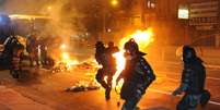 <p>Niterói, em mais uma noite de protestos</p>  Foto: AFP