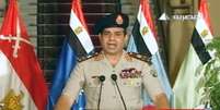 <p>O general Abdel Fatah al-Sisi faz anúncio à nação egípcia em rede nacional de televisão: deposição de Mursi e período interino de transição com convocação de novas eleições</p>  Foto: AFP