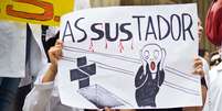 Cartaz no Rio de Janeiro usa imagem imortalizada no quadro O Grito, de Edvard Munch, para criticar o Sistema Único de Saúde: asSUStador  Foto: Reynaldo Vasconcelos / Futura Press