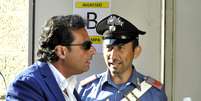 O capitão Francesco Schettino chega em tribunal de Grosseto nesta terça-feira  Foto: AP