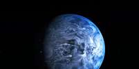 Impressão artística do planeta azul HD 189733b mostra cores que lembram a Terra  Foto: NASA, ESA, M. Kornmesser / Divulgação