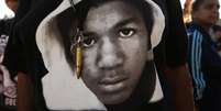 Manifestante usa uma camiseta com a foto de Trayvon Martin  Foto: AP