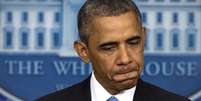 Obama apareceu de surpresa na sala de imprensa da Casa Branca para falar sobre o caso  Foto: AP