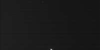 Imagem feita pela sonda Cassini, e ainda não processada pela Nasa, mostra o Sol e a Terra  Foto: NASA/JPL/Space Science Institute / Divulgação